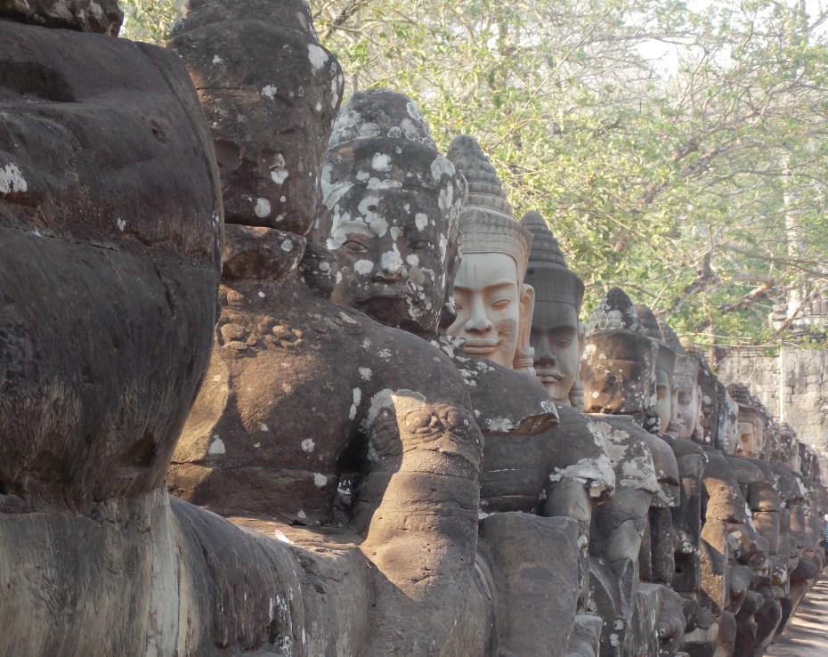 The entrance to Angkor is lined with gods and demons.