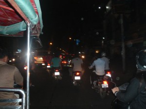 In a tuk tuk you are definitely in the middle of the action.