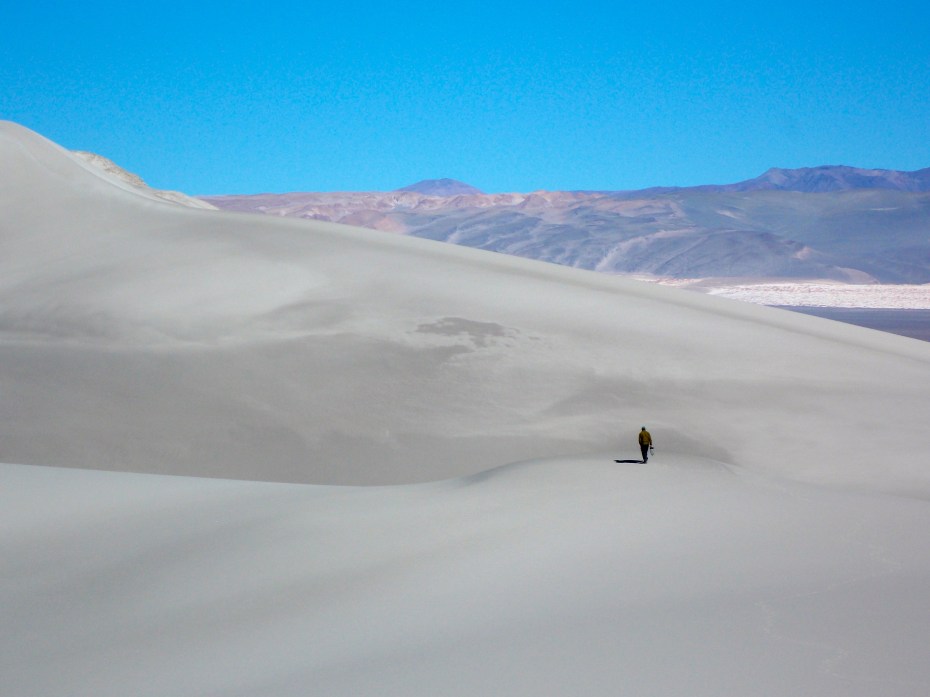 Sebastian provides some perspective. The sand here is all blown over into this corner of the mountains from ...